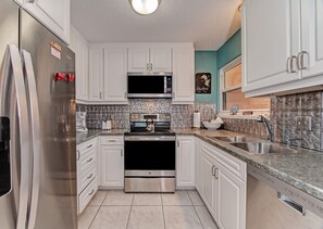 Fridge, microwave, oven, stovetop - Unit #304 Sand Cay Beach Resort Gulf Front (Sarasota)
