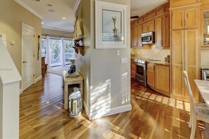 Enjoy cooking in this well-equipped kitchen with appliances and a central island.