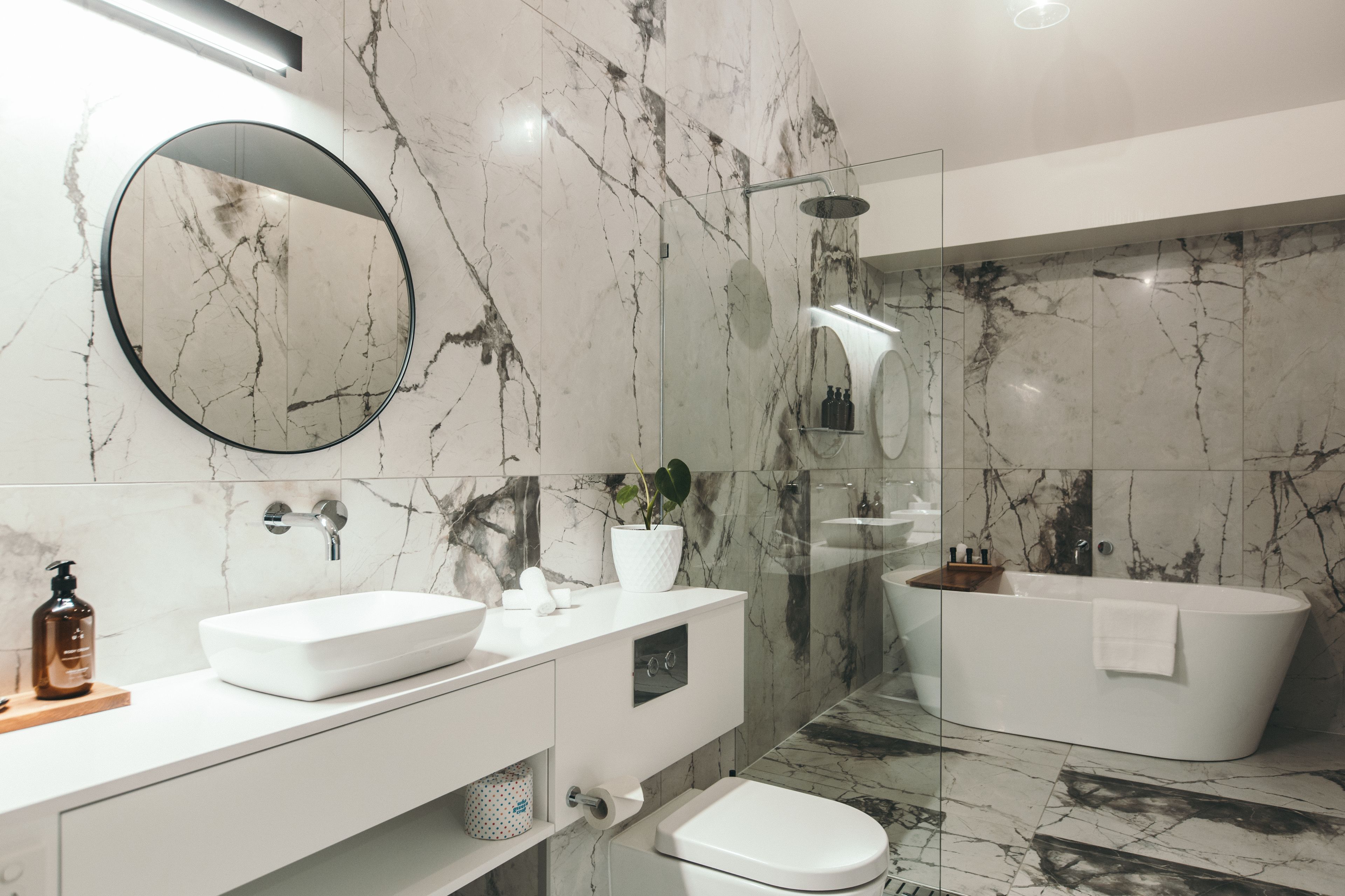 deluxe studio suite, 2 bedrooms | bathroom | designer toiletries, hair dryer, bathrobes, slippers