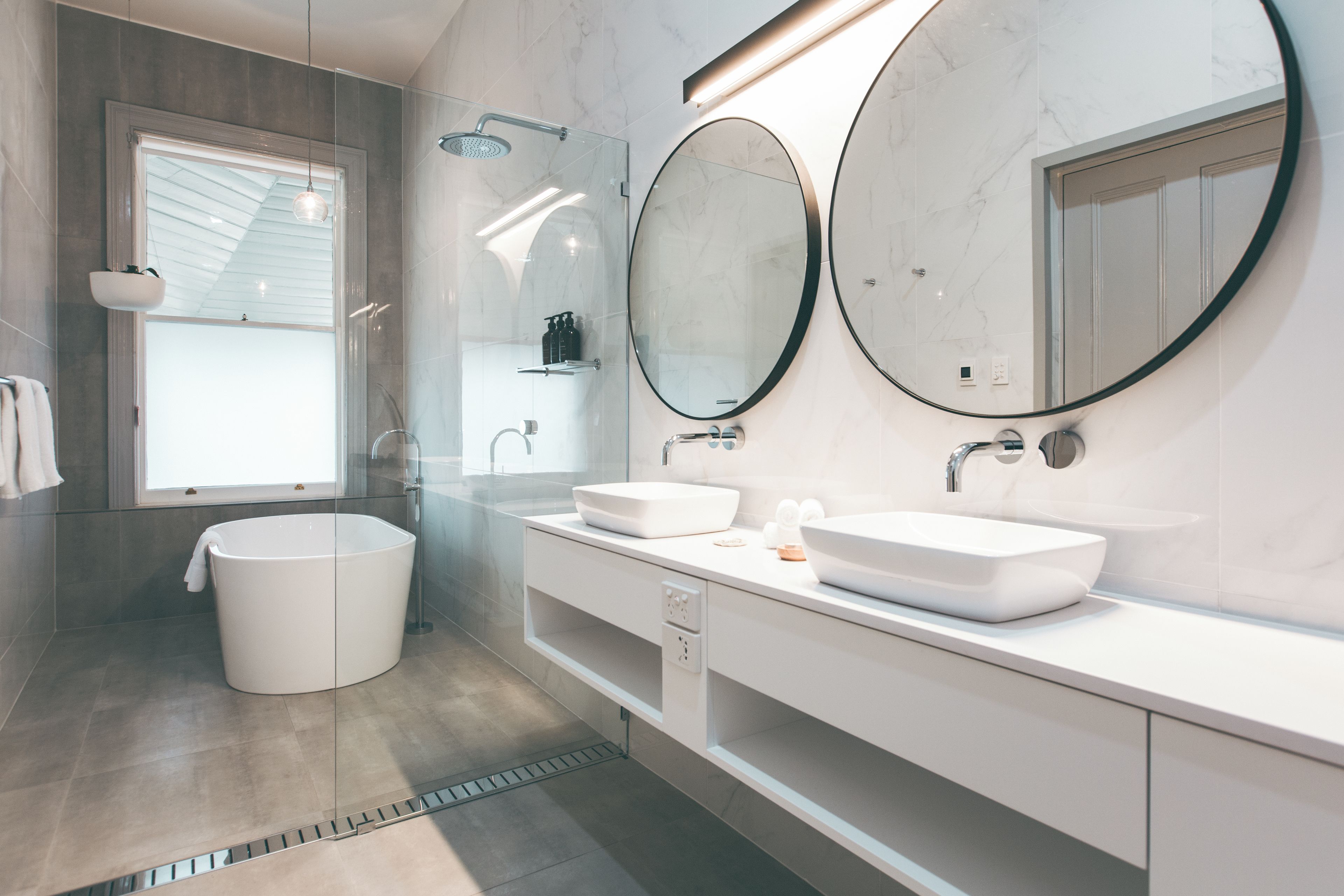 hunter suite | bathroom | designer toiletries, hair dryer, bathrobes, slippers