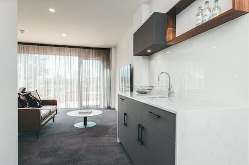 Suite superior | Ropa de cama de alta calidad y minibar