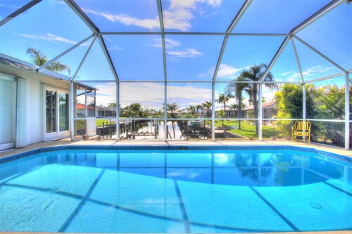 5 bedroom, South facing, FREE heated salt water pool, with Direct Gulf access