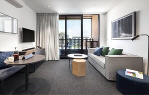 Lägenhet Executive - 2 sovrum | Vardagsrum | Platt-tv