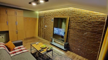 Televisión LCD de 150 cm con canales vía satélite y televisión