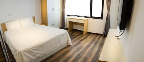 Apartment, 1 Bedroom | 1 bedroom, desk, blackout curtains, iron/ironing board