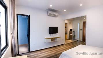 Apartment, 1 Bedroom | 1 bedroom, desk, blackout drapes, iron/ironing board