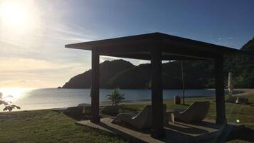 On the beach, free beach shuttle, beach cabanas, sun loungers