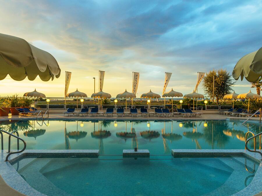 Outdoor pool, pool umbrellas, pool loungers