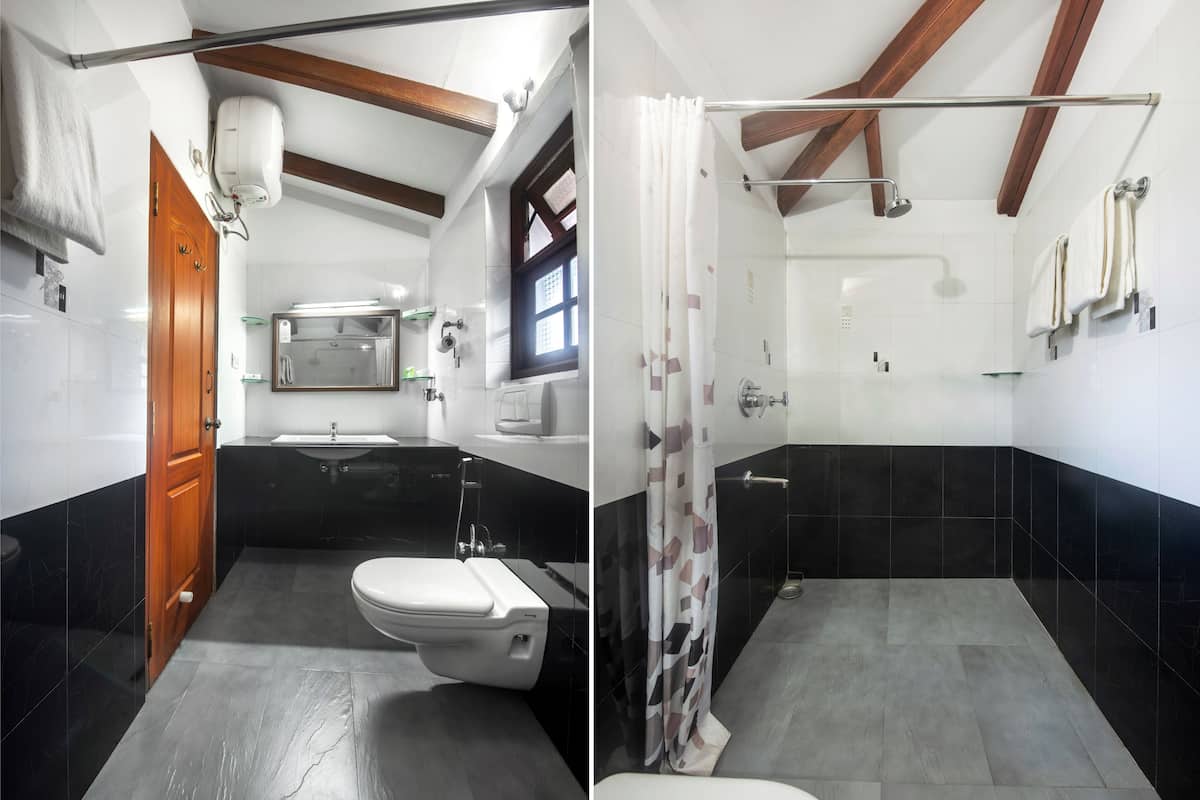 family suite with fireplace | bathroom | shower, free toiletries, slippers, towels