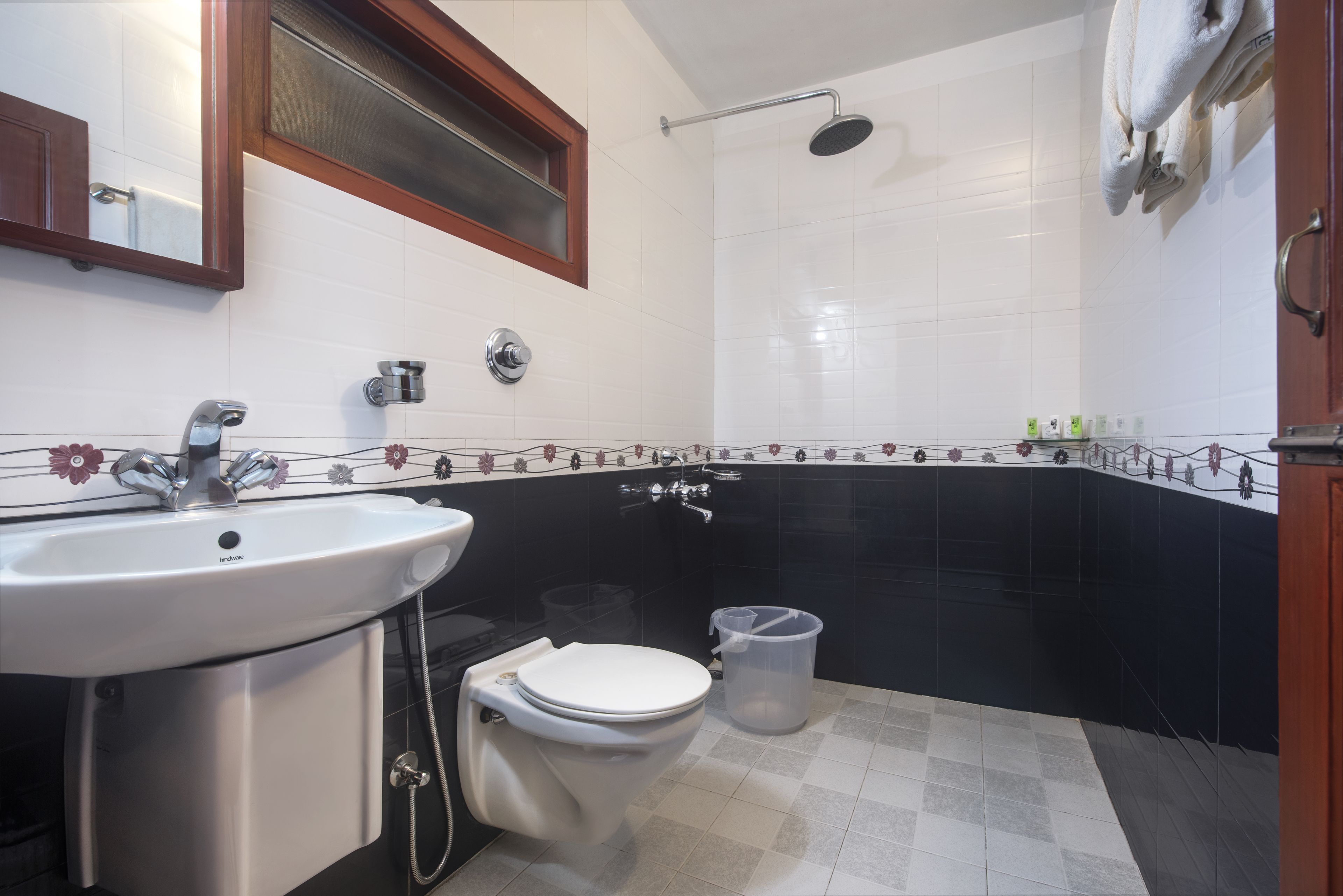 shower, free toiletries, slippers, towels