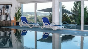 Indoor pool, open 7 AM to 9 PM, sun loungers