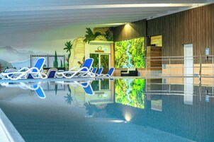 Indoor pool, open 7 AM to 9 PM, sun loungers