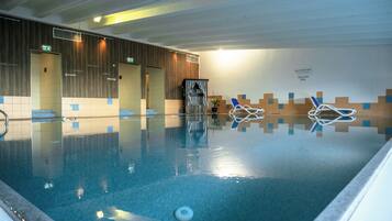Indoor pool, open 7 AM to 9 PM, pool loungers