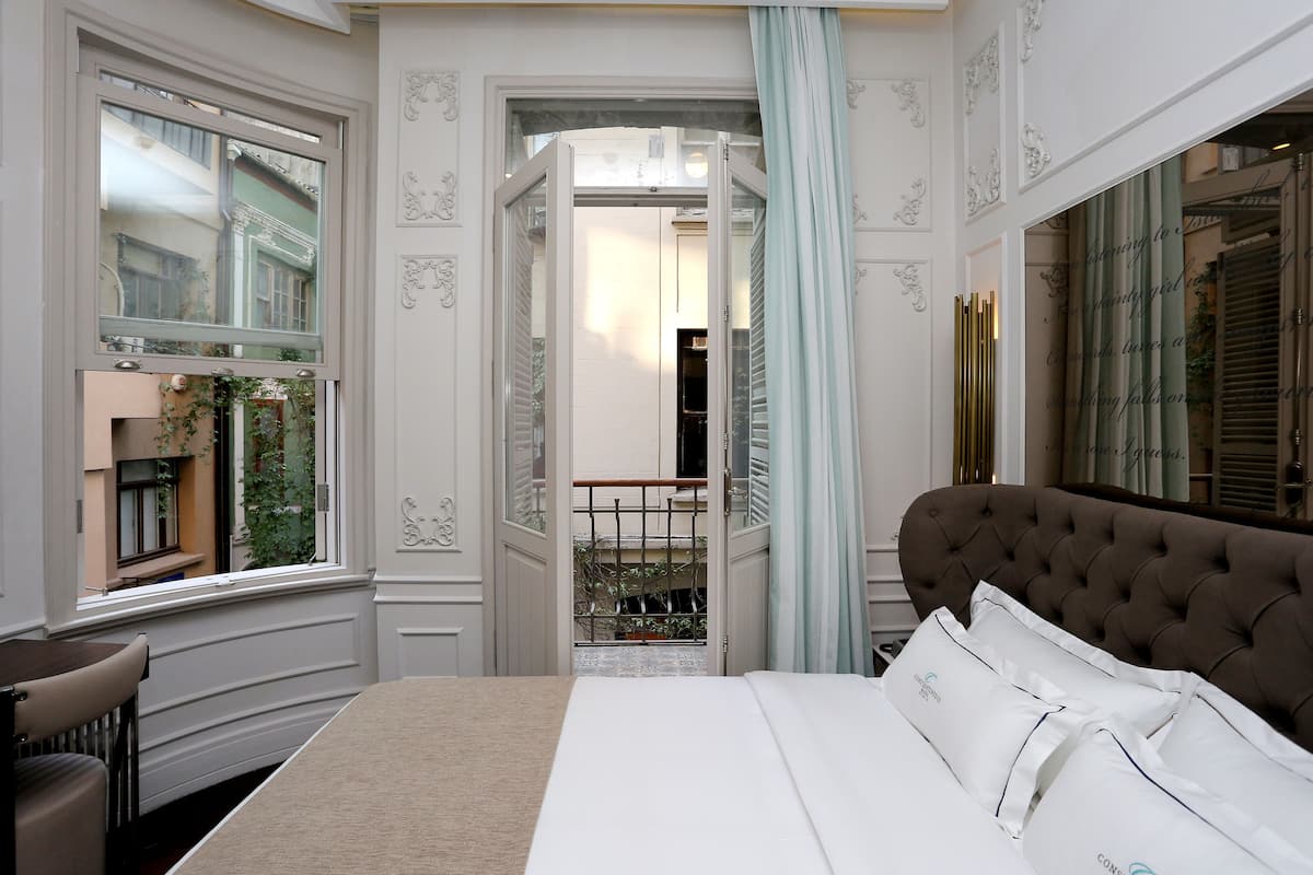 Standard Room, Balcony | 2 bedrooms, premium bedding, minibar, in-room safe