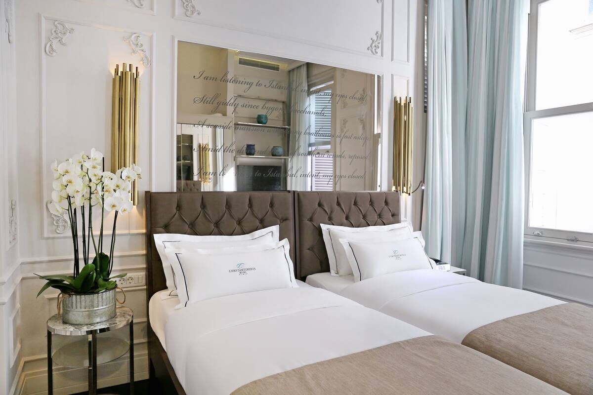 Suite Deluxe | Literie de qualité supérieure, minibar, coffres-forts dans les chambres