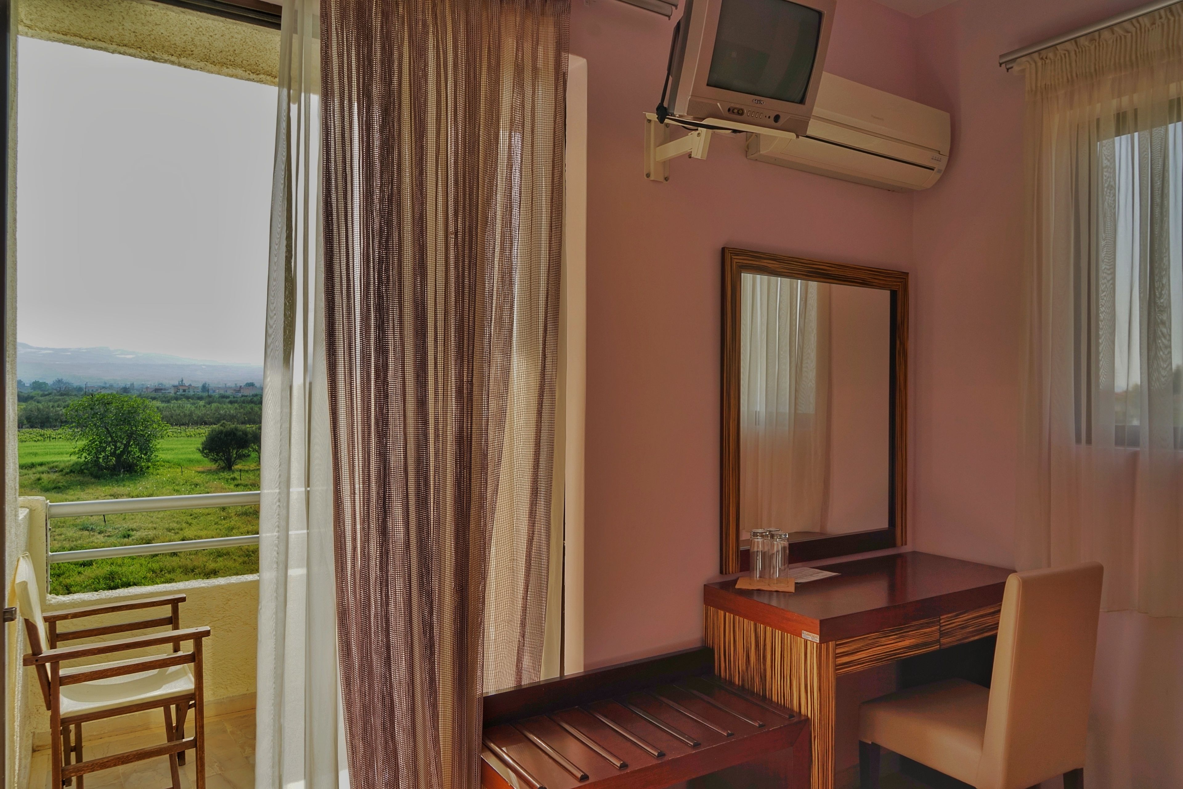 standard triple room, garden view | soundproofing, free cots/infant beds, free wifi, bed sheets