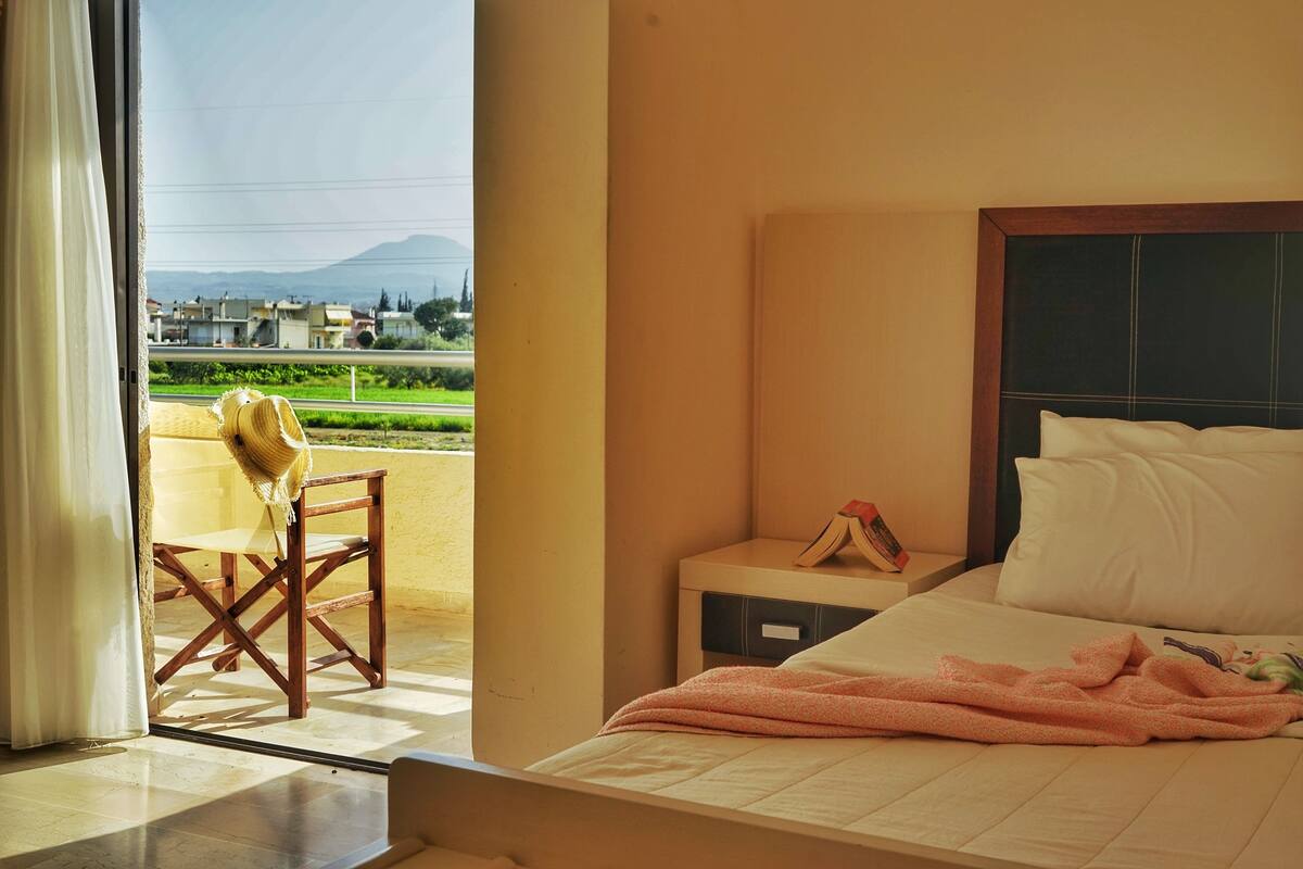 standard triple room, garden view | soundproofing, free cots/infant beds, free wifi, bed sheets