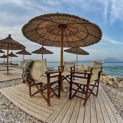 On the beach, sun-loungers, beach umbrellas