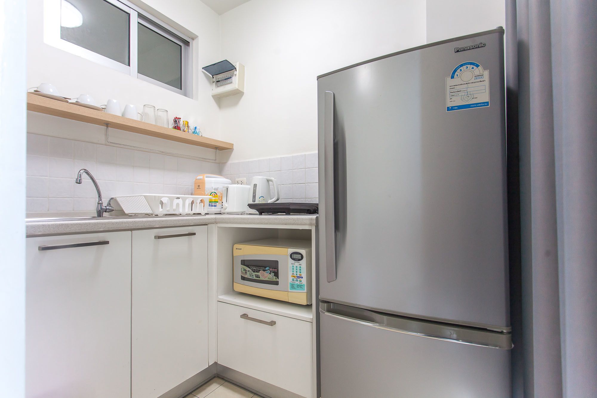 1-Bedroom Classic Apartment | Private kitchenette | Full-sized fridge, microwave, stovetop, electric kettle
