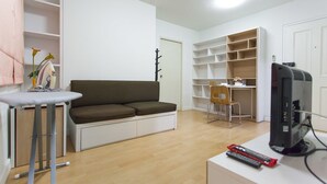 1-Bedroom Superior Apartment | Living area | 32-inch flat-screen TV with cable channels, TV