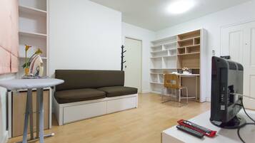 1-Bedroom Superior Apartment | Living area | 32-inch flat-screen TV with cable channels, TV