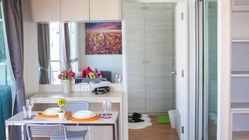 1-Bedroom Superior Apartment | Living area | 32-inch flat-screen TV with cable channels, TV