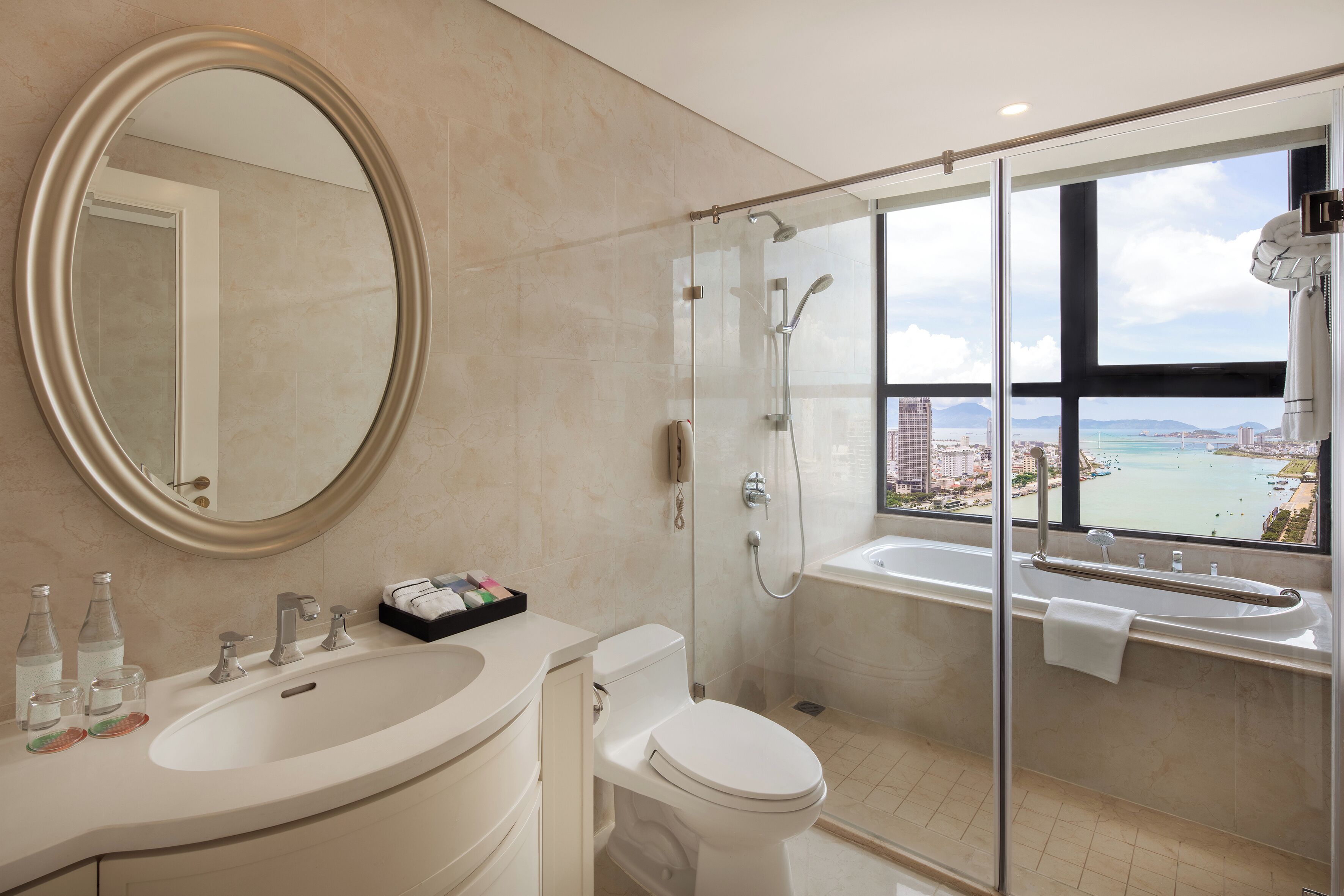 designer toiletries, hair dryer, bathrobes, slippers