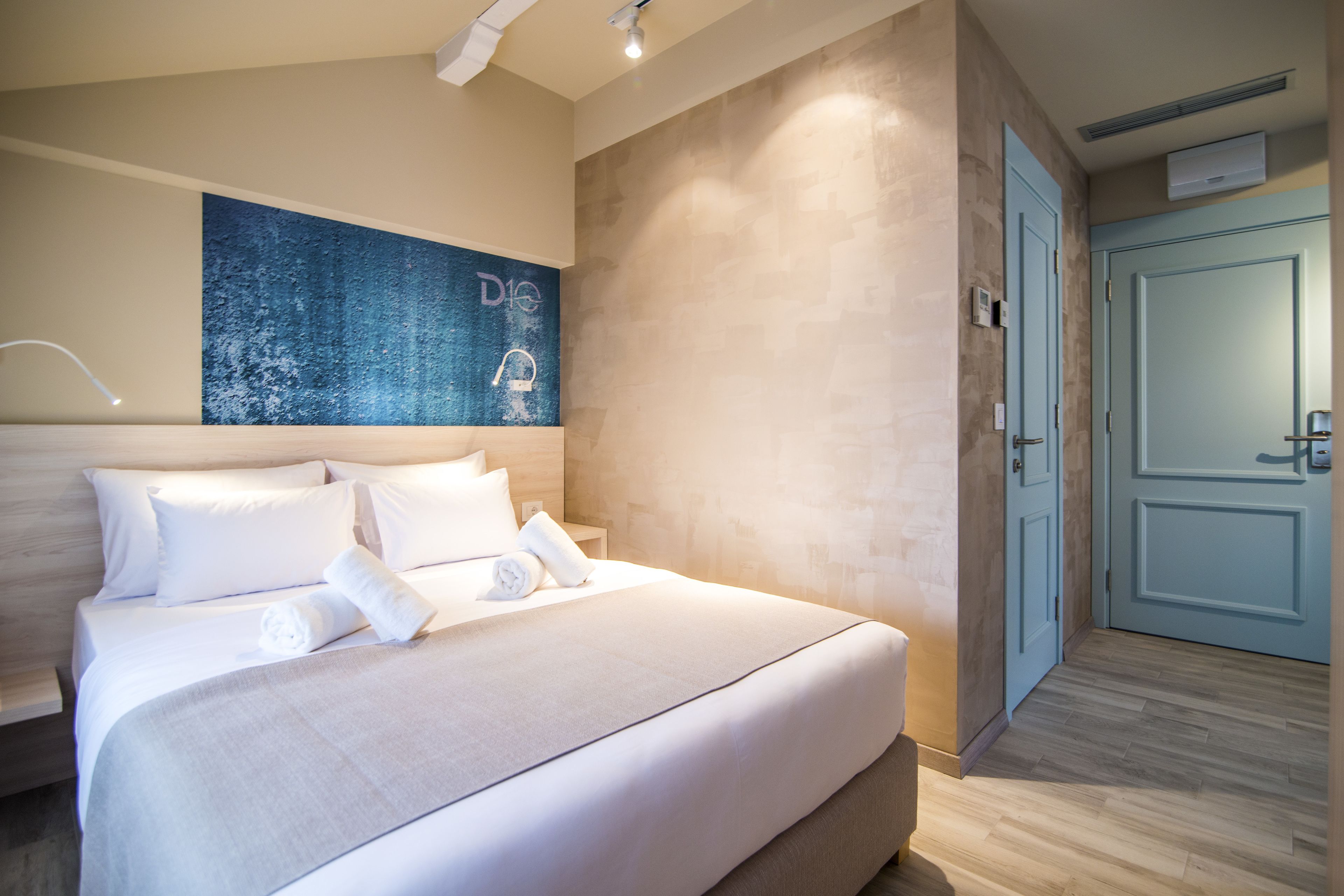 basic quadruple room | minibar, in-room safe, desk, laptop workspace