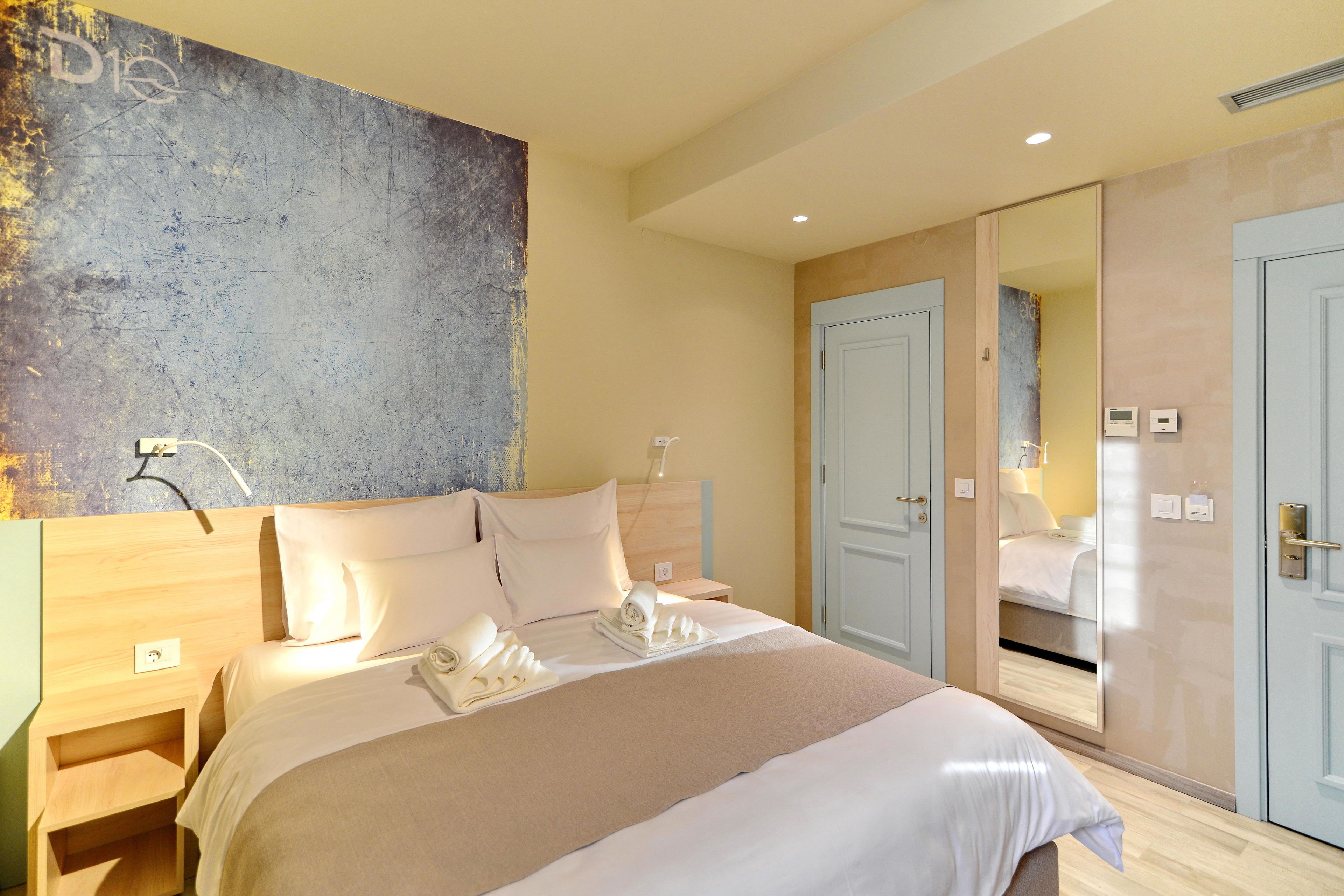 superior double or twin room | minibar, in-room safe, desk, laptop workspace