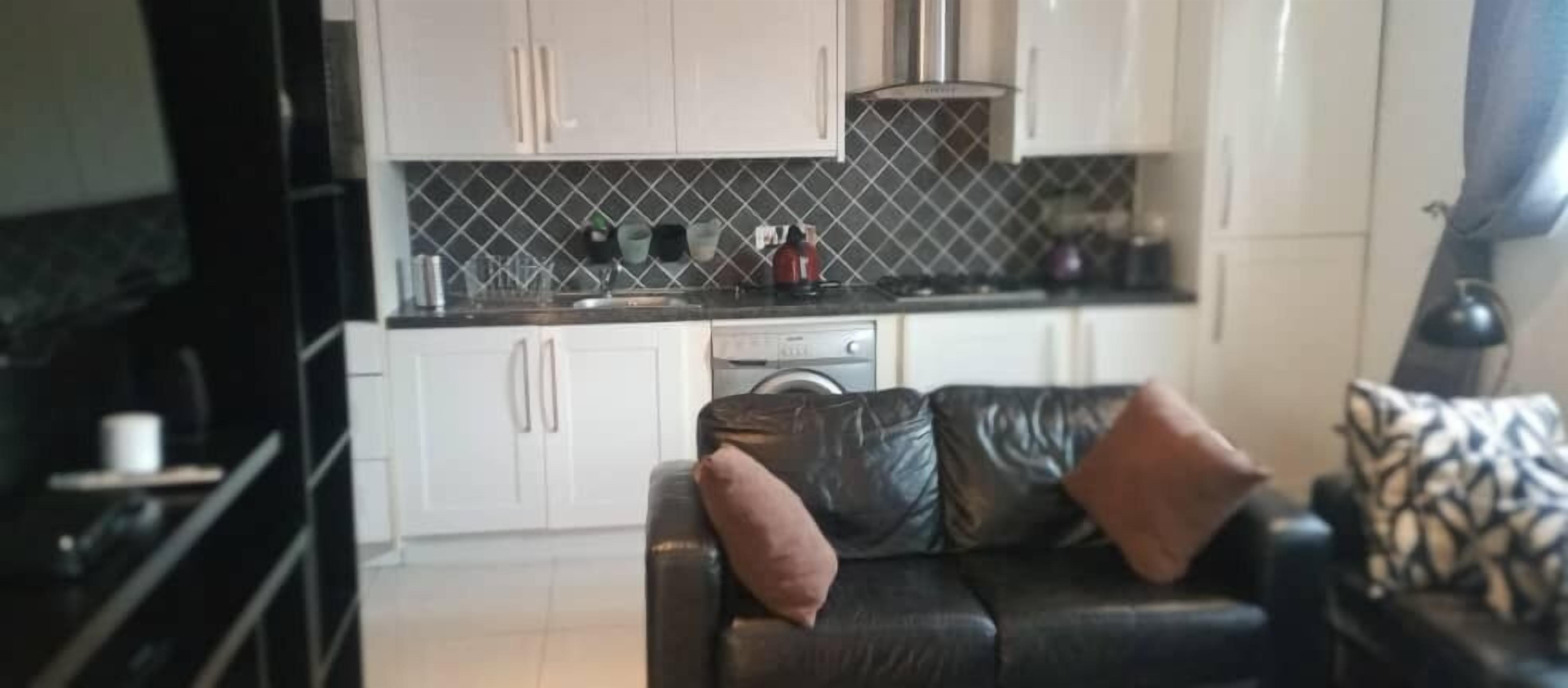 Apartment, 1 Bedroom | Living area | Flat-screen TV