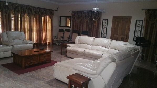 Deluxe Room, 3 Bedrooms | Living room | 40-inch flat-screen TV with cable channels, TV - Lord Apartment West Legon Accra (Accra)