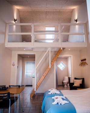 Condo luxo, 1 quarto, acessível, vista para o jardim | Área de estar | TV de tela plana