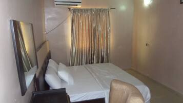 Desk, laptop workspace, free WiFi, bed sheets