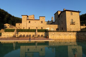 Seasonal outdoor pool, pool umbrellas, pool loungers