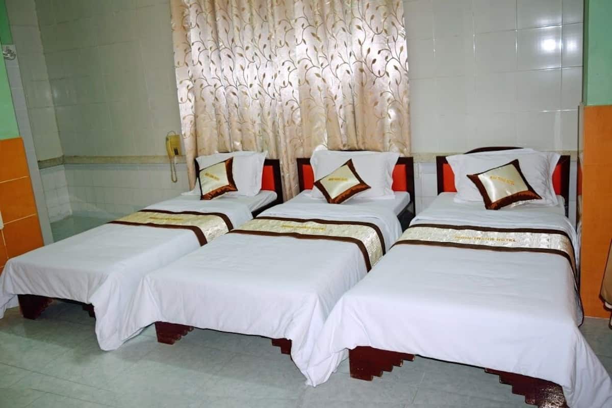 Triple Room | Minibar, in-room safe, desk, soundproofing