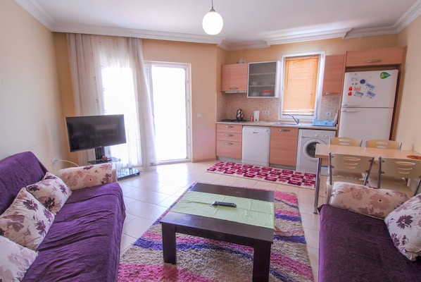Apartment, 3 Bedrooms | Living area
