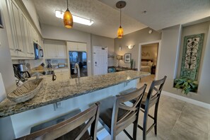 Condo, 2 Bedrooms | Private kitchen | Fridge, microwave, oven, coffee/tea maker