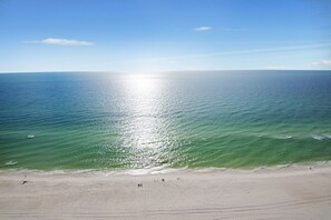 Condo, 2 Bedrooms | Beach | On the beach, beach umbrellas - Tropical High-Rise Condo with Beachside Pool Access and Free Poolside WiFi - Unit 2004 by RedAwning (Panama City Beach)