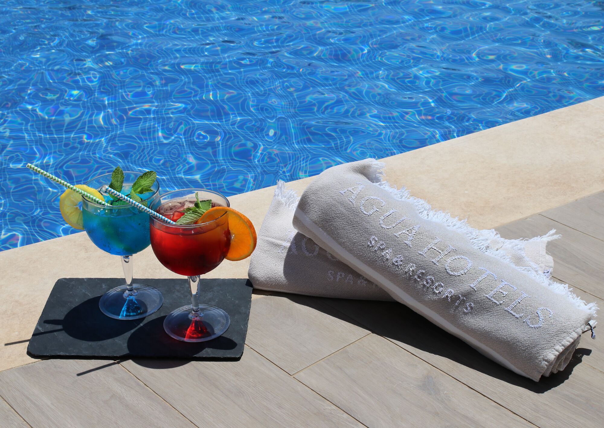 outdoor pool, pool umbrellas, pool loungers