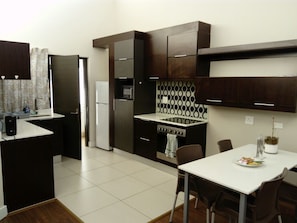 Modern 2 Bedroom Serviced Apartment (Sunset view) | Private kitchen | Fridge, microwave, oven, stovetop