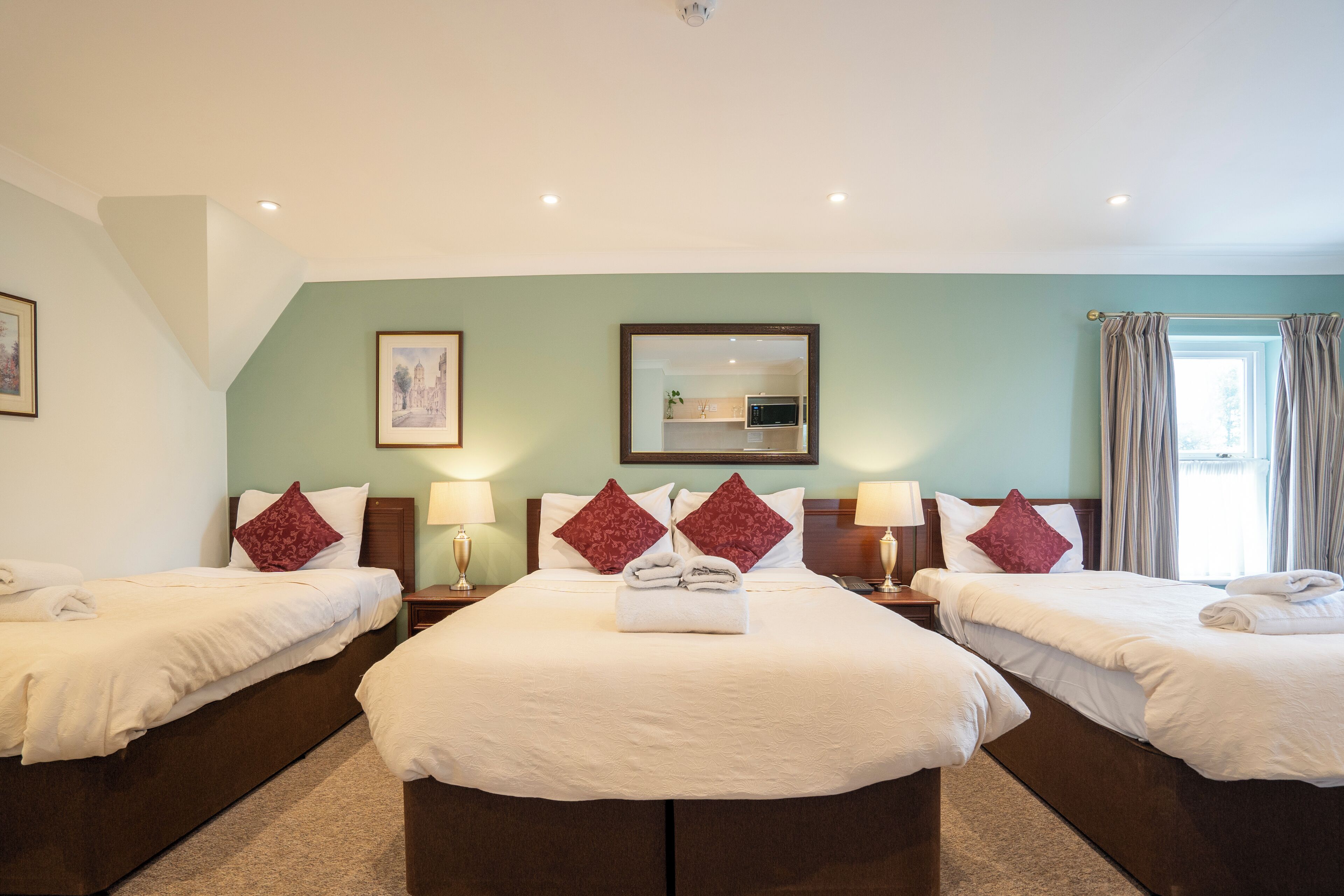 Family Quadruple Room, Kitchenette | Premium bedding, minibar, desk, soundproofing