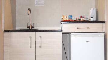 Fridge, microwave, coffee/tea maker, electric kettle