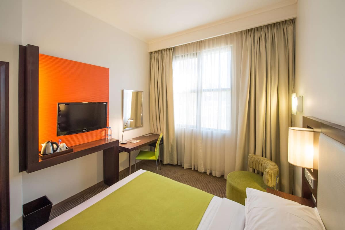 double room | premium bedding, desk, blackout curtains, soundproofing