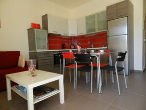 Deluxe Apartment, 2 Bedrooms, Kitchen, Sea View | Private kitchen | Fridge, electric kettle, cookware/dishes/utensils - Infinity Blue Beach Apartments (Zakynthos)