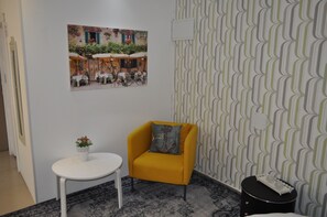 Classic Suite, 1 Bedroom | Living room | Flat-screen TV - Richmond Estate (Had Nes)