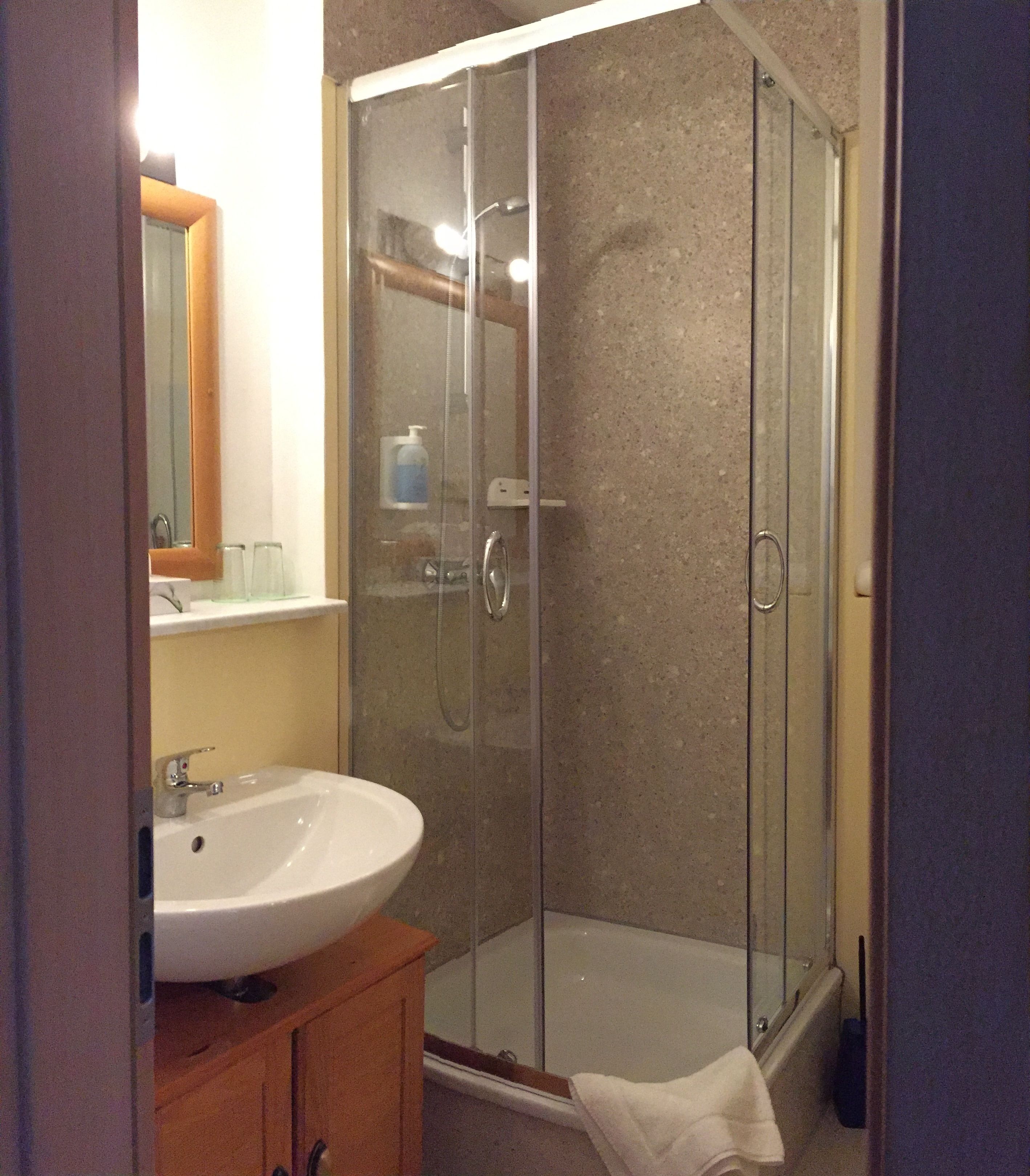 shower, free toiletries, towels