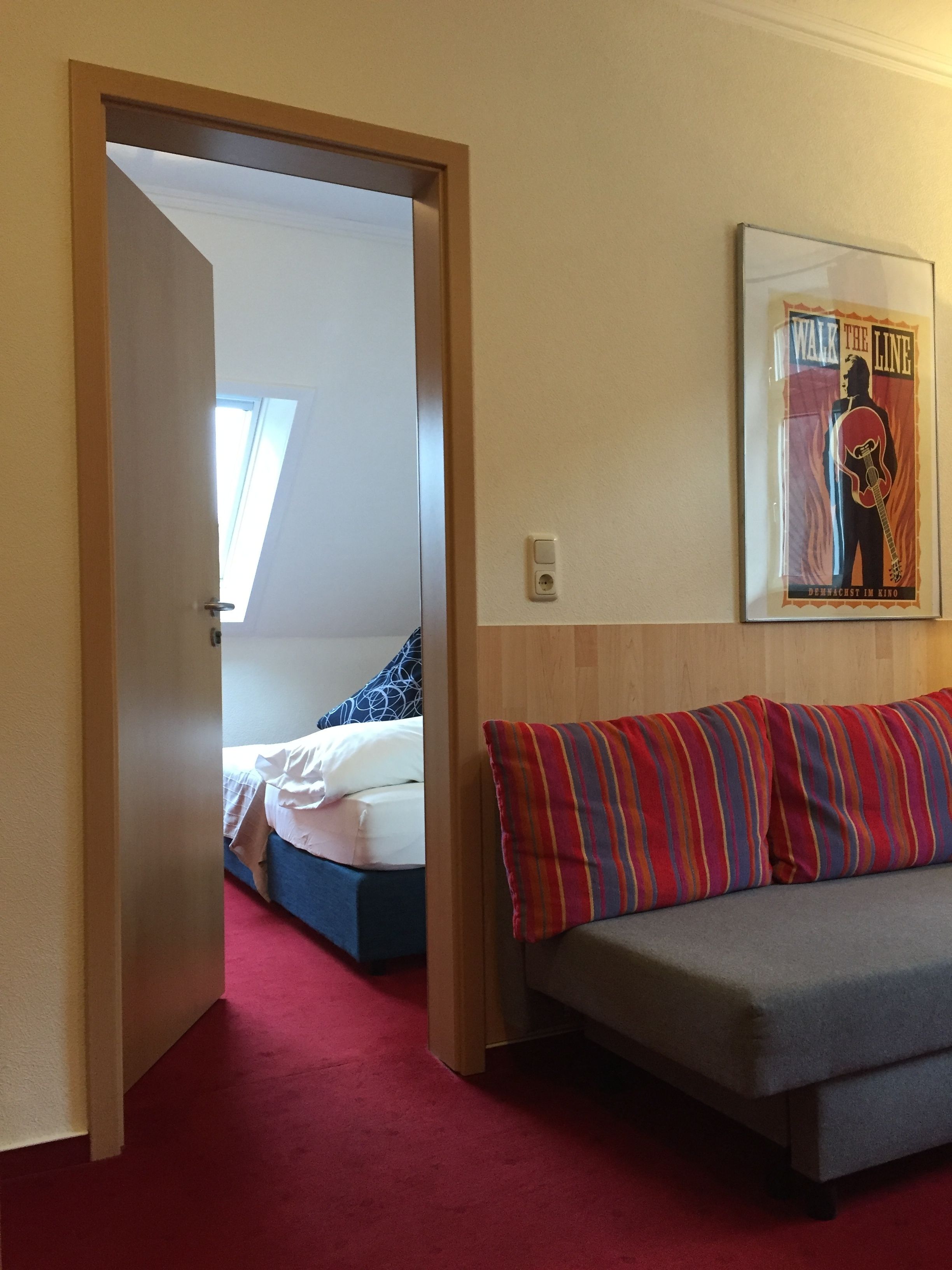 family room | desk, iron/ironing board, rollaway beds, free wifi