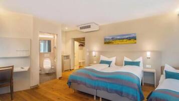 Premium bedding, in-room safe, desk, soundproofing