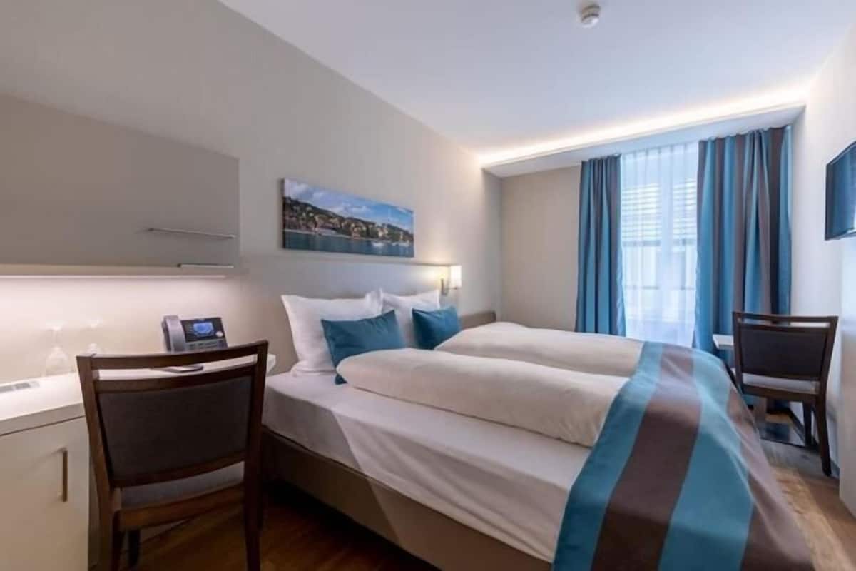 Literie de qualité supérieure, coffres-forts dans les chambres, bureau