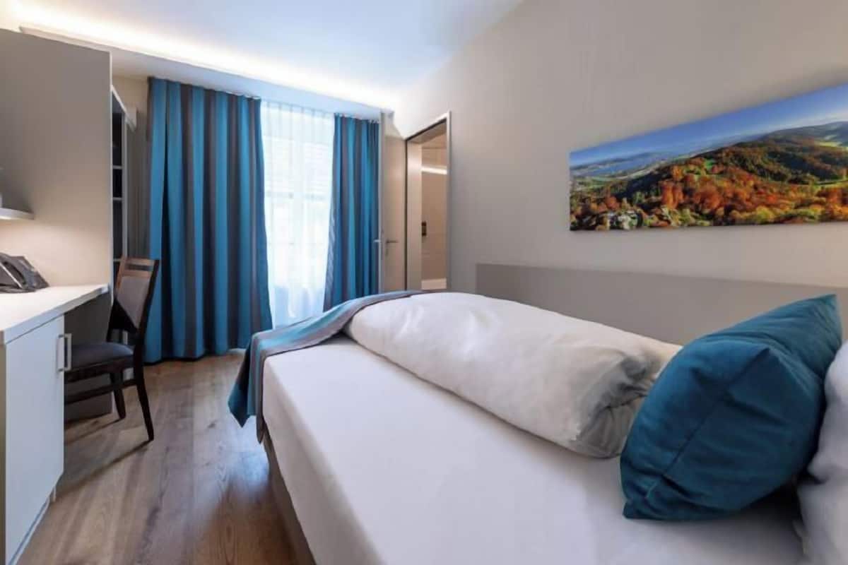 Premium bedding, in-room safe, desk, soundproofing